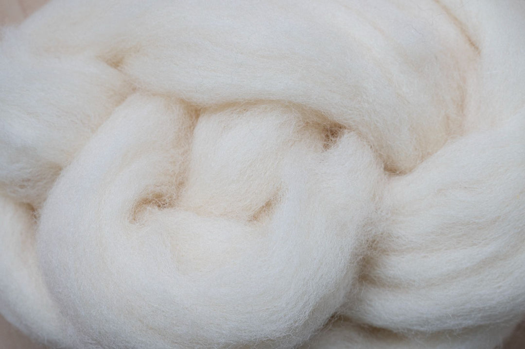 spinning fibers into yarn